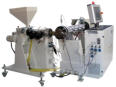 Coextruder for medical hoses with contrasting stripes